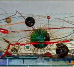 John Balsley, "News From China," 1987-1988, mixed media: plastic, steel, resins, wood, etc.: sculpture, 18”H x 48”W